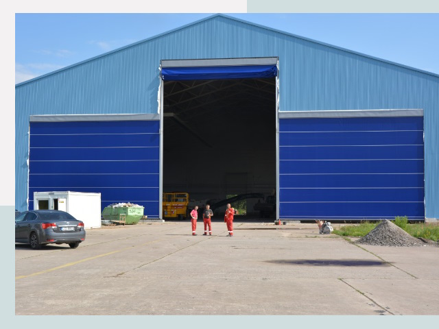 Ангарные ворота в Дзержинский от СтальСтрой-Дзж по цене 614 руб.